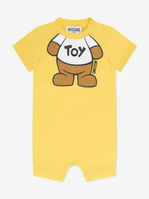 Moschino Baby Teddy Toy Romper in Yellow